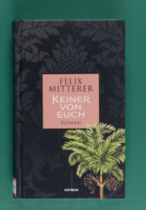 Okładka książki w kolorze czarnym. N pierwszym planie zielona palma.