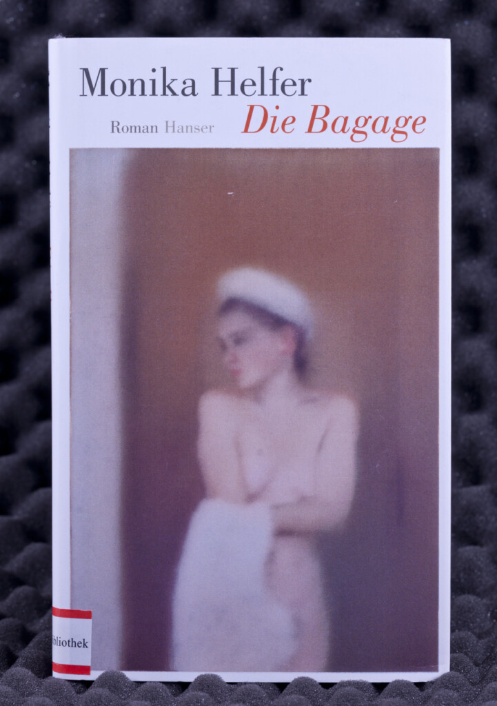 okładka książki Die Bagage, na niej niewyraźne zdjęcie częściowo nagiej kobiety