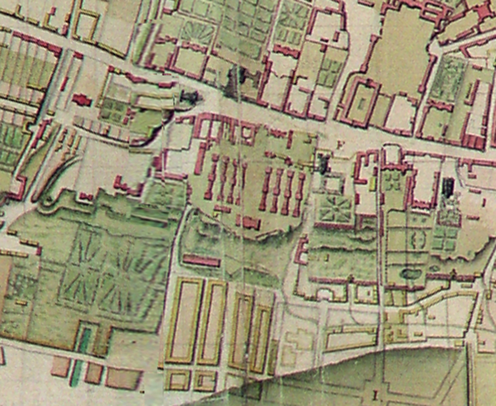 Fragment mapy z zaznaczonymi budynkami oraz terenami zielonymi